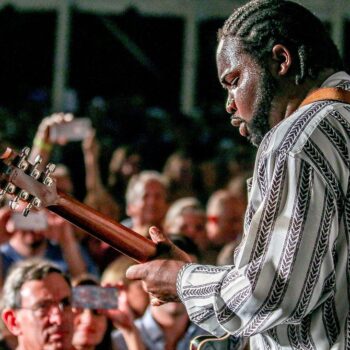 famous musician playing for crowd